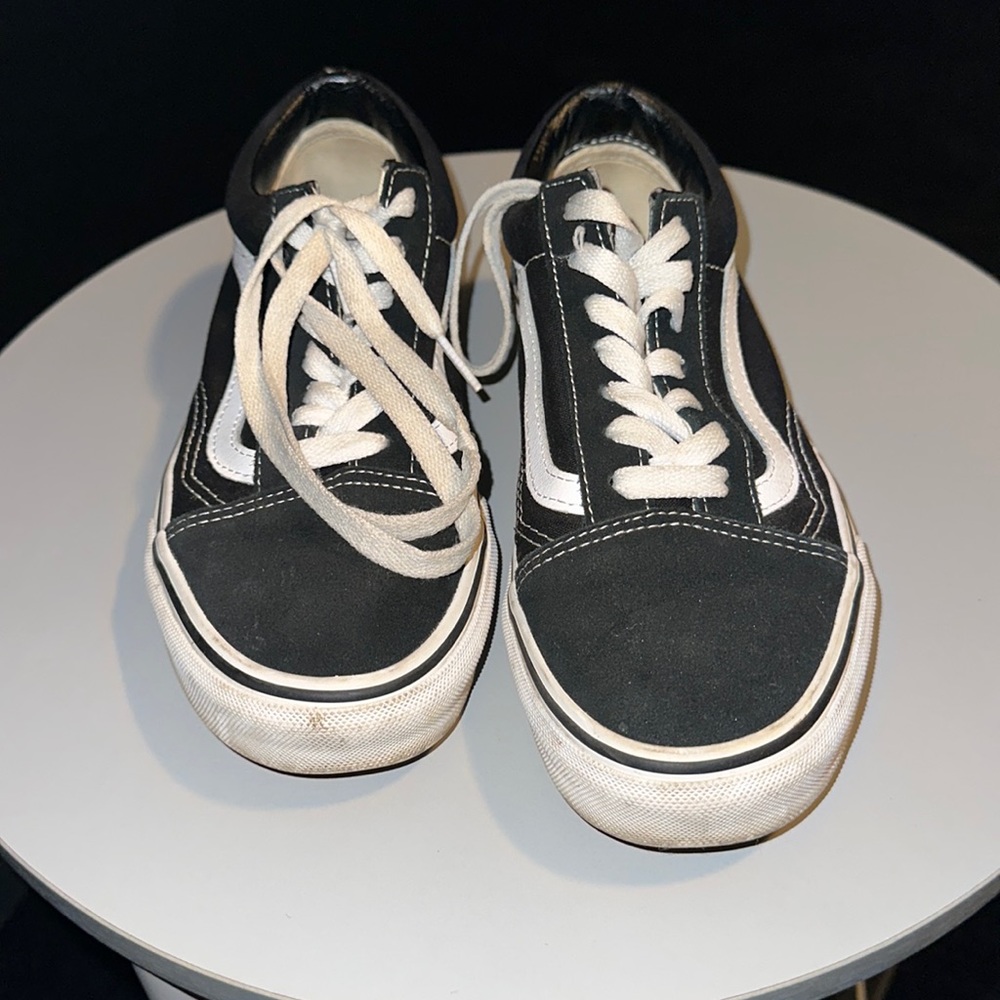 Vans black and white shoes.